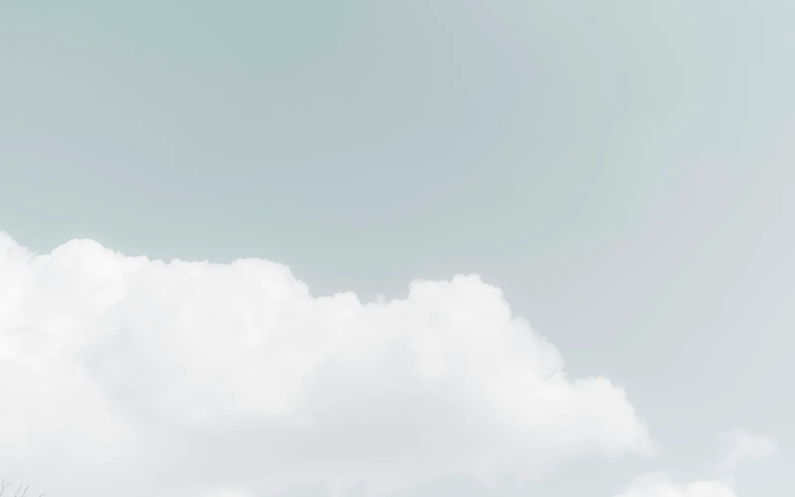 White clouds against a blue sky