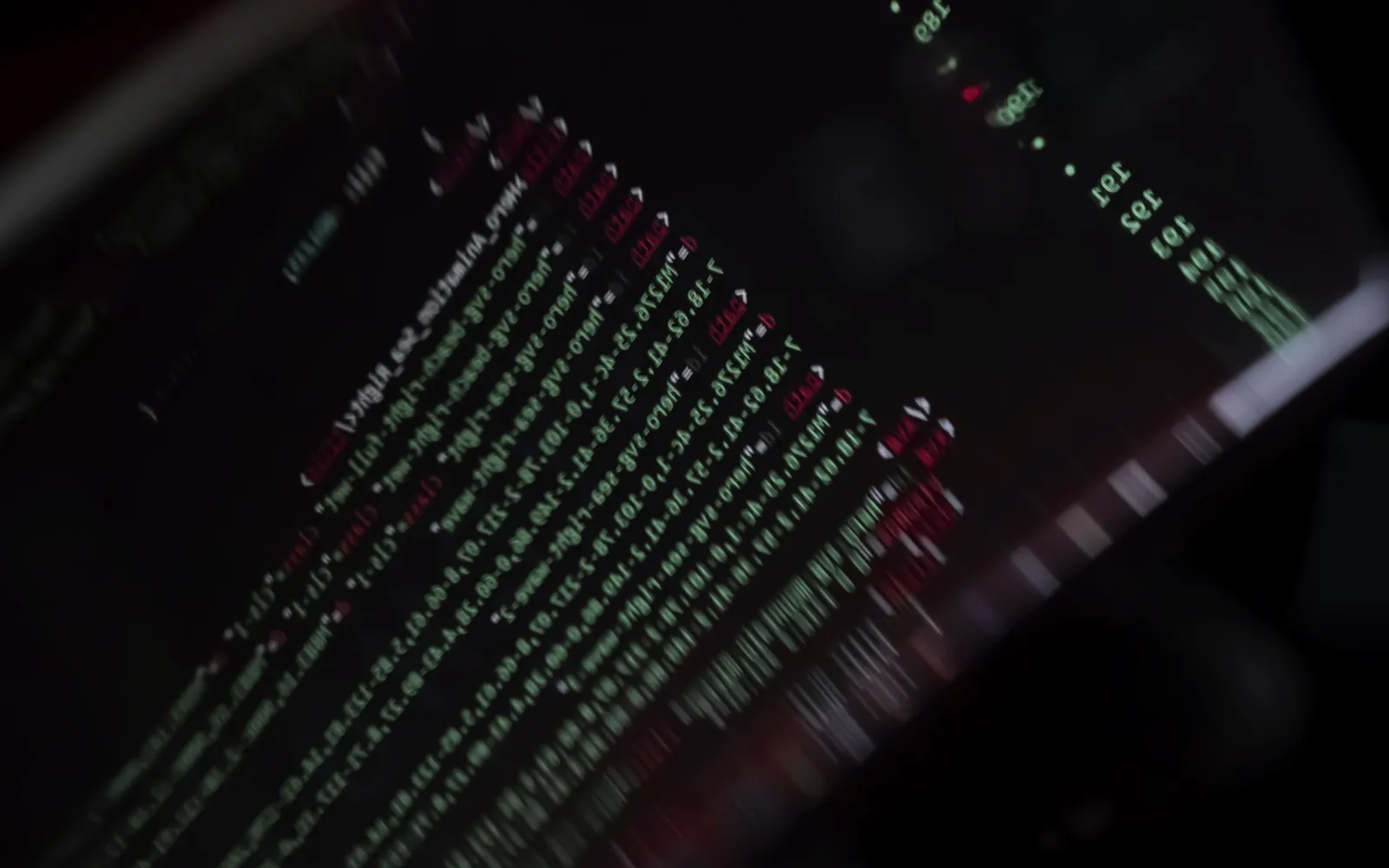 Terminal text scrolling across a tilted dark screen