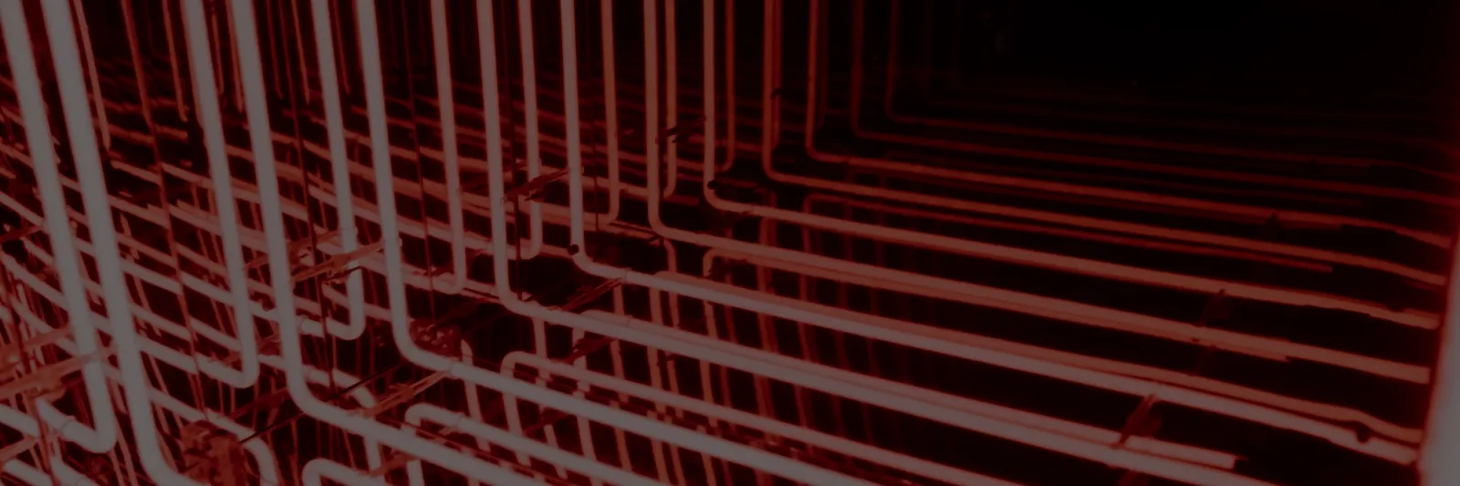 Red neon light bars in a dark corridor